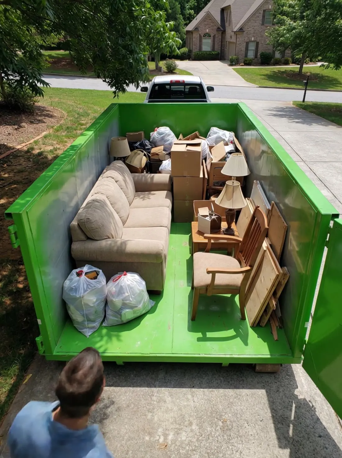 Walking into a loaded 15-yard dumpster through the walk-in door
